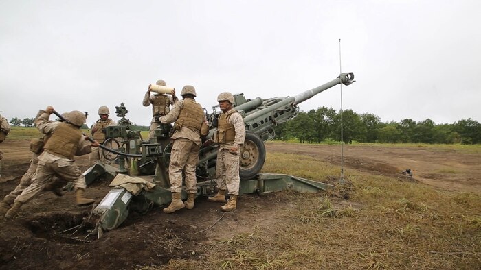 In this file photo, Marines load a high-explosive round into an M777A2 lightweight 155 mm howitzer during live-fire artillery training Sept. 2 at the Yausubetsu Maneuver Area in Hokkaido as part of Artillery Relocation Training Program 14-2. During ARTP 14-2, the Marines focused on improving teamwork and building camaraderie through the execution of constant fire missions. The Marines are with Battery B, 1st Battalion, 12th Marine Regiment, currently assigned to 3rd Battalion, 12th Marines, 3rd Marine Division, III Marine Expeditionary Force. 