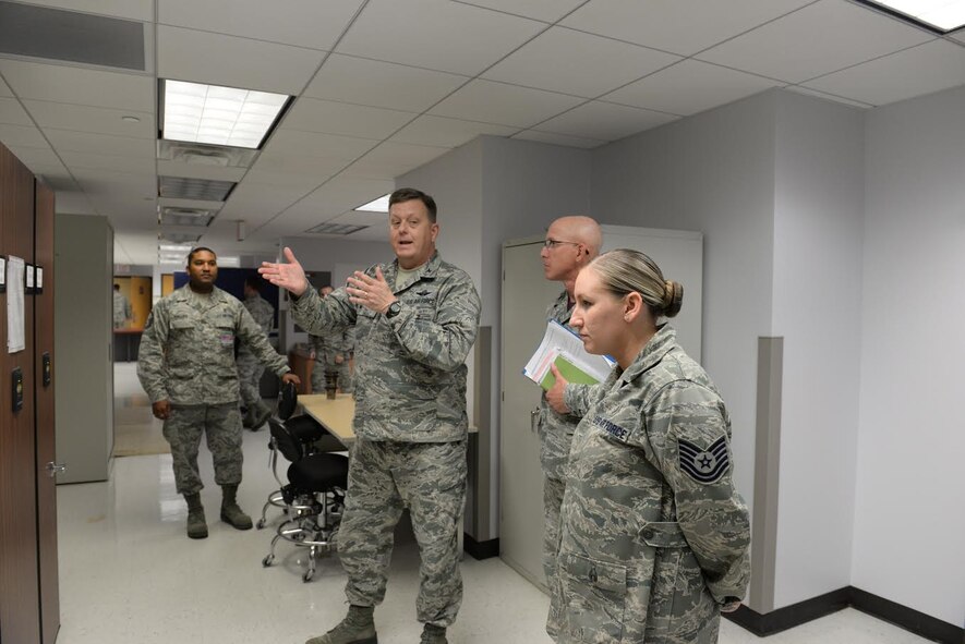 Col. Timothy MacGregor, Air Education and Training Command Inspector General's office Inspection Division chief, visits with medical administration specialist airmen at the 82nd Medical Group, Sheppard Air Force Base, Texas, April 22, 2016. MacGregor, while at Sheppard for an inspection of the 82nd Training Wing and 80th Flying Training Wing, makes it a point to visit the airmen that are in the same career field that he started in over 30 years ago as a reminder of where his career began. (U.S. Air Force photo/2nd Lt. Brittany Curry)