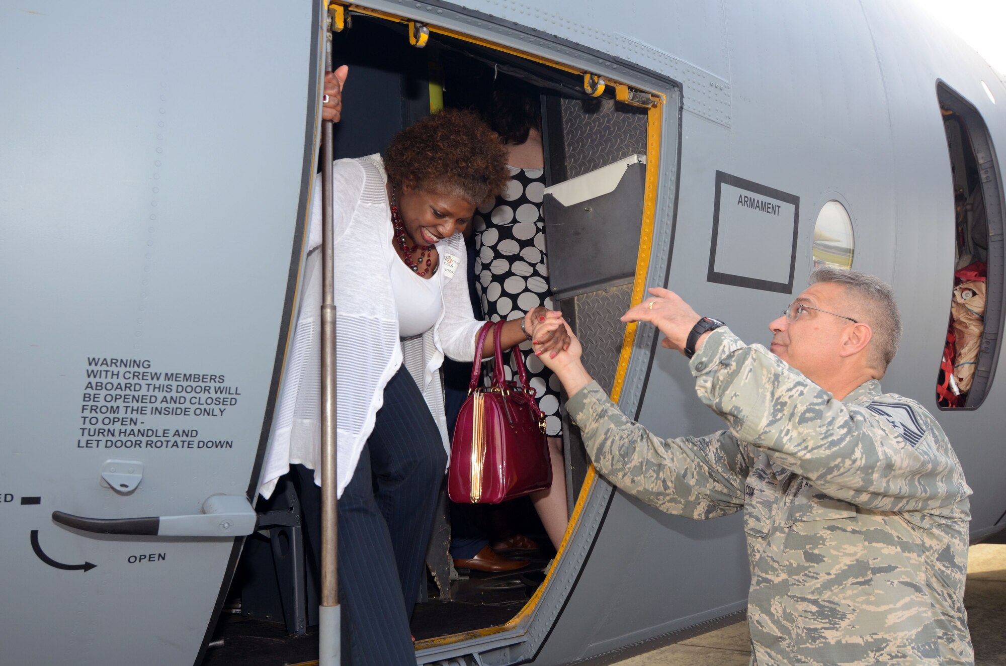 Military and civilian guests register as the Dobbins Business After Hours, held at Dobbins Air Reserve Base, Ga. April 27, 2016. The program, sponsored by the 94th Airlift Wing is designed to join local community members and base personnel in an evening of interaction. Guests were treated to food prepared by Local restaurants. (U.S. Air Force photo by Don Peek)
