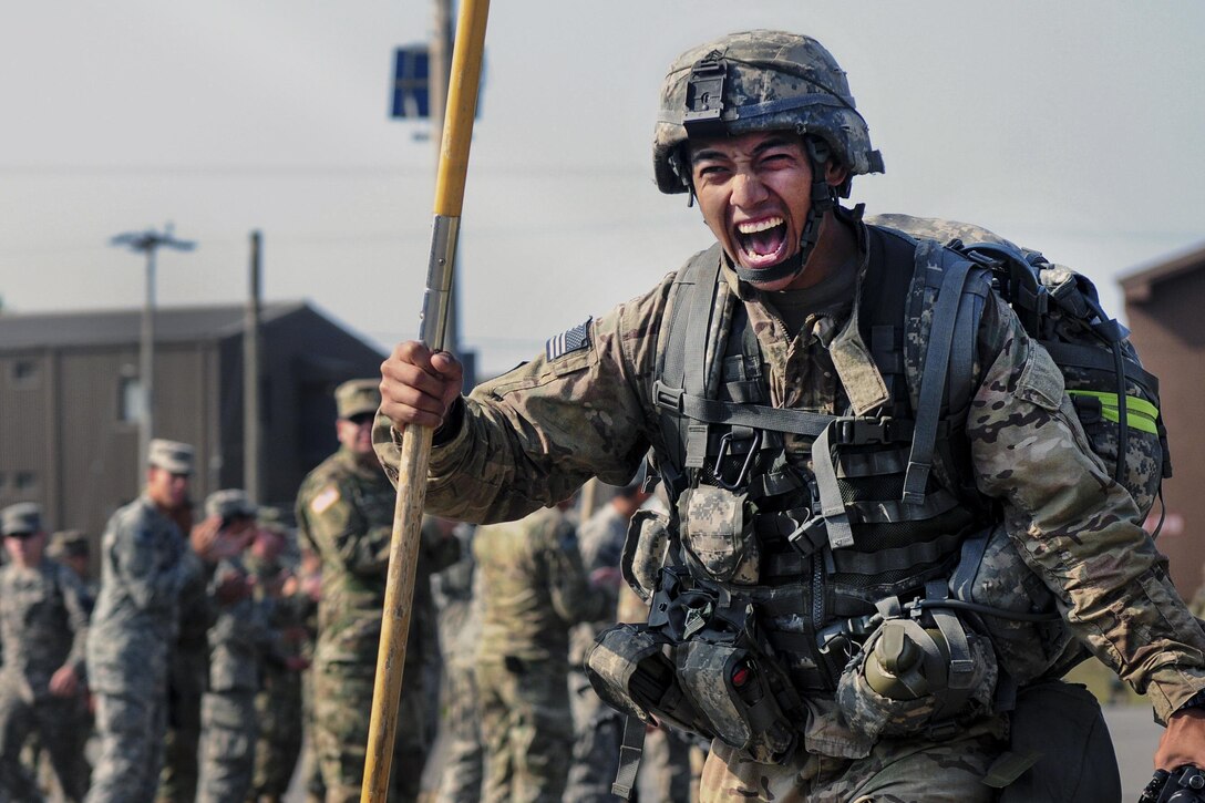 Army Sgt. Genaro Bueno completes the final portion of a 12-mile ruck march at Warrior Base near Panmunjeom, South Korea, April, 29, 2016. The ruck march was conducted as the final event during the Expert Field Medical Badge training event. Bueno is assigned to the 65th Medical Brigade. Army photo by Pfc. Lee, Kyeong-min