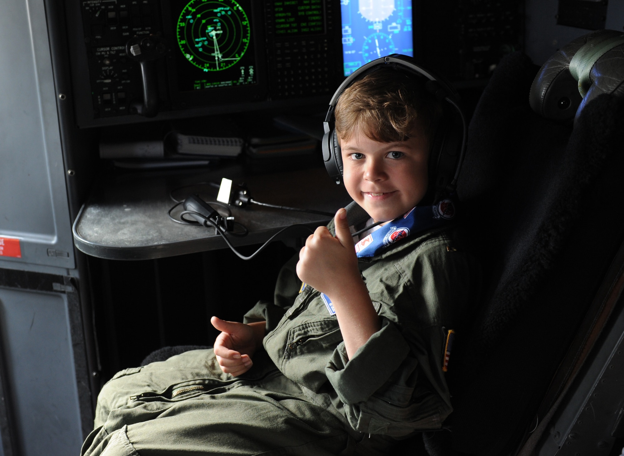 Jon Bryant “JB” Orso sits aboard a WC-130J Super Hercules during the 403rd Wing’s first Pilot for a Day event April 26, 2016, Keesler Air Force Base, Miss. Orso, who served as an honorary Air Force Reserve second lieutenant, is in remission after receiving treatment for Acute Lymphoblastic Leukemia. Pilot for a Day is a community outreach program for children who live with a chronic or life-threatening disease or illness. (U.S. Air Force photo by Kemberly Groue)