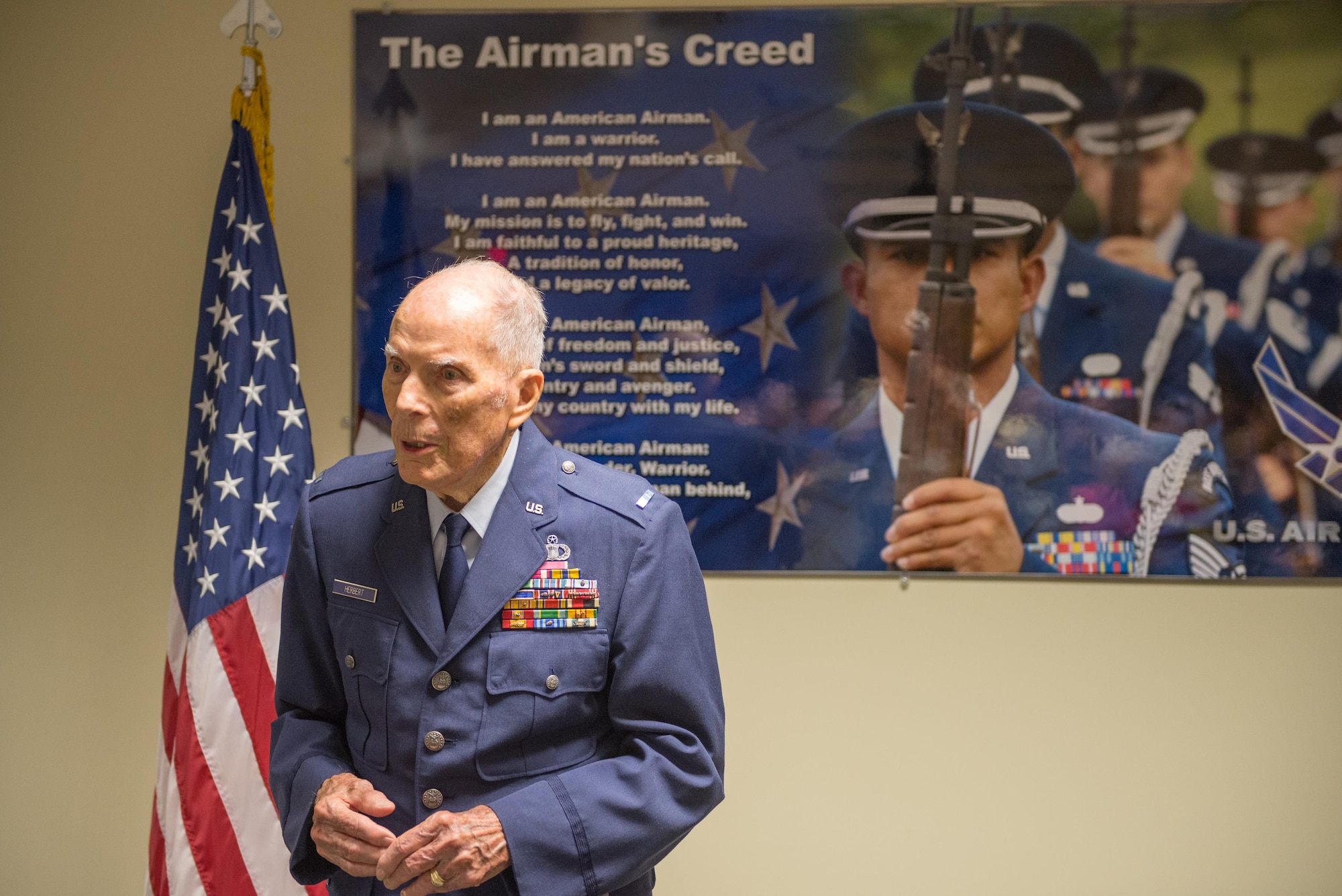 Retired Chief Warrant Officer 4 Francis Herbert delivers remarks during a room dedication ceremony in his honor in Cody Hall April 26, 2016, Keesler Air Force Base, Miss. The room was dedicated to him for his 50 years of service in air traffic control in the Army, Army Air Corps, and Air Force from 1942-1972 then as a Keesler civilian instructor for 20 years. (U.S. Air Force photo by Marie Floyd)