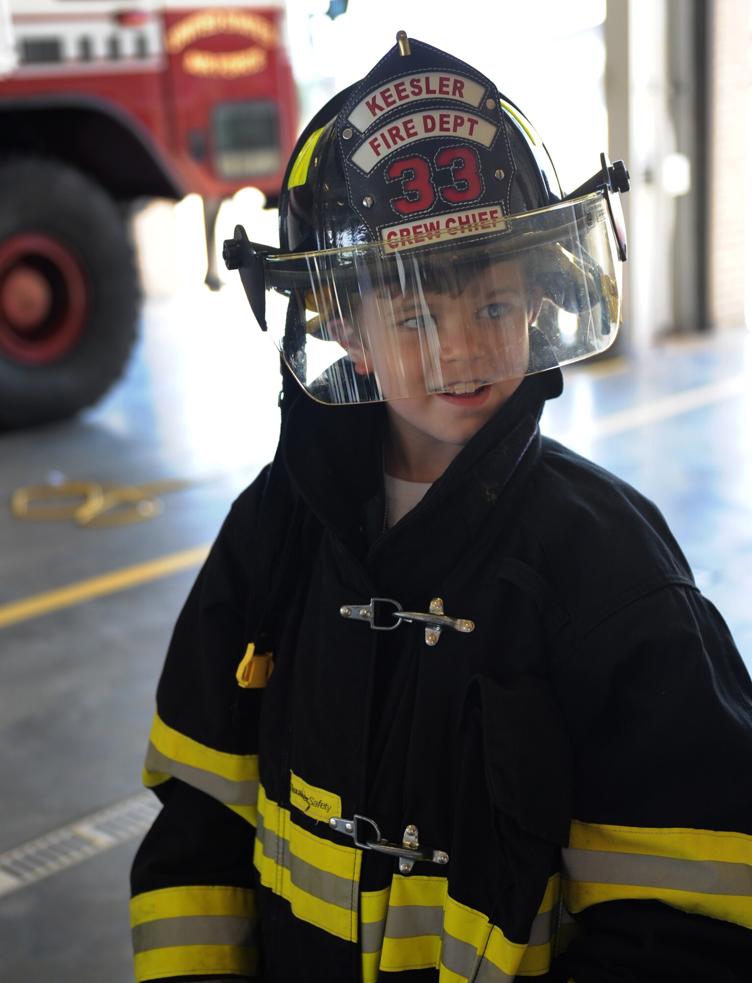 Jon Bryant “JB” Orso wears firefighter equipment while touring the Keesler Fire Department during the 403rd Wing’s first Pilot for a Day event April 26, 2016, Keesler Air Force Base, Miss. Orso, who served as an honorary Air Force Reserve second lieutenant, is in remission after receiving treatment for Acute Lymphoblastic Leukemia. Pilot for a Day is a community outreach program for children with a chronic or life-threatening disease or illness. (U.S. Air Force photo by Kemberly Groue)