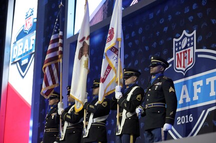 The Army Reserve’s 85th Support Command color guard team presents the colors during the playing of the National Anthem at the first day of the NFL Draft in Chicago, April 28, 2016. Service members, from each branch of service, participated in the opening ceremony to include Army Staff Sgt. Ian Bowling, U.S. Army Field Band, who sang the National Anthem.
(U.S. Army photo by Mr. Anthony L. Taylor/Released)