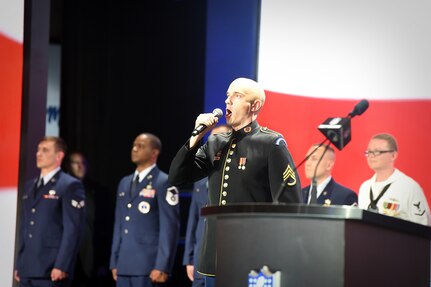 US Army Staff Sgt. Ian Bowling, U.S. Army Field Band, sings the National Anthem, on stage, during the first day of the NFL Draft in Chicago, April 28, 2016. Service members, from each branch of service, participated in the opening ceremony of the three-day draft event to include the Army Reserve’s 85th Support Command who presented the colors during the playing of the National Anthem.
(U.S. Army photo by Spc. David Lietz/Released)