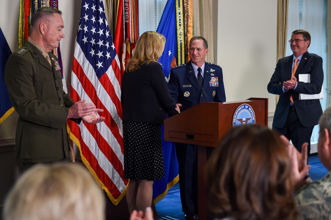 Defense Secretary Ash Carter, right, and Marine Corps Gen. Joe Dunford, left, chairman of the Joint Chiefs of Staff, applaud as Air Force Secretary Deborah Lee James shakes hands with Air Force Vice Chief of Staff Gen. David L. Goldfein during an event at the Pentagon April 29, 2016, following Goldfein's nomination as Air Force chief of staff. DoD photo by Army Sgt. 1st Class Clydell Kinchen
