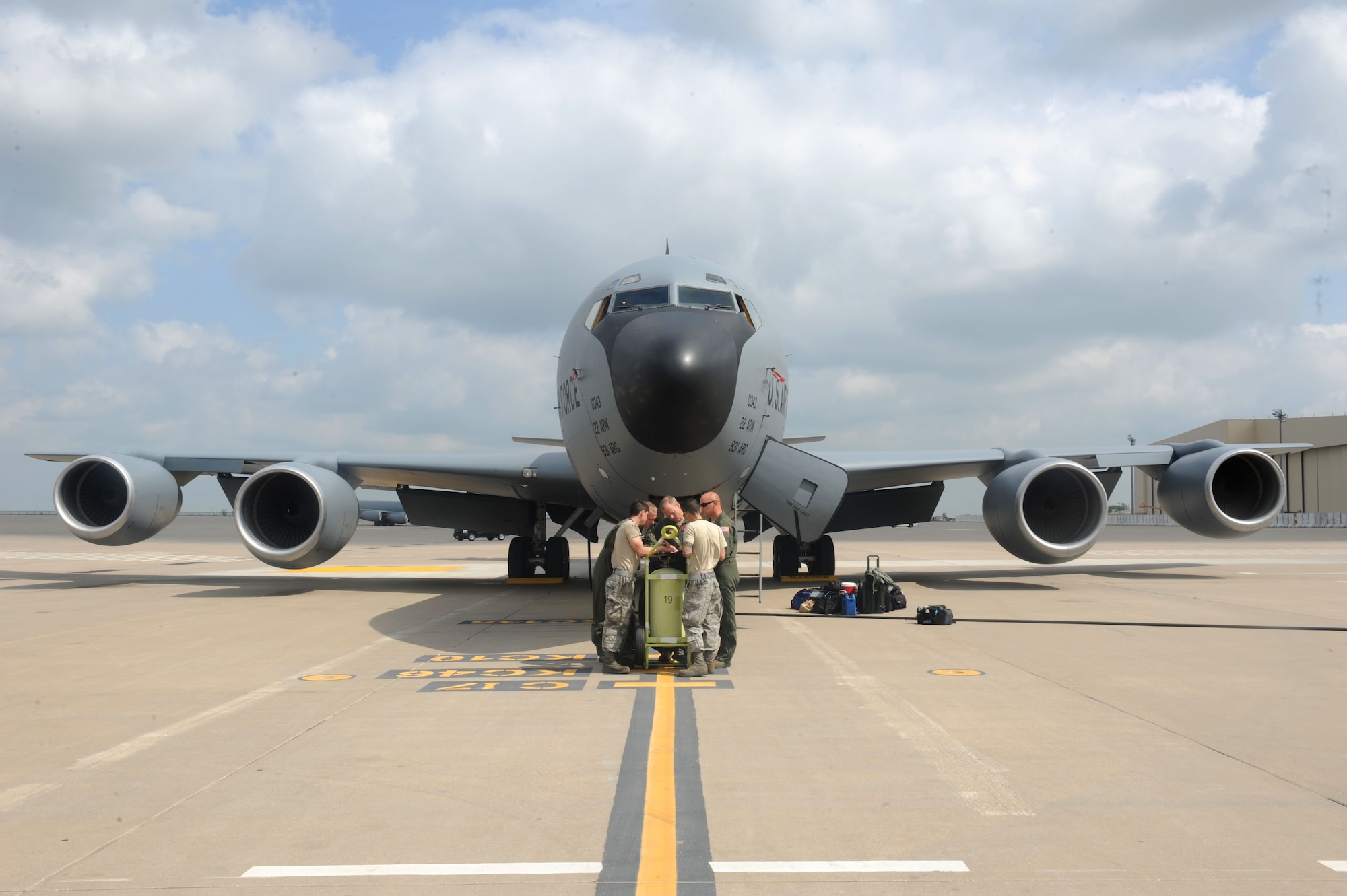 McConnell Airmen review a checklist prior to departing, April 26, 2016, at McConnell Air Force Base, Kansas. Team McConnell worked together to evacuate 19 aircraft to different bases across the country after receiving a severe weather warning. (U.S. Air Force photo by Senior Airman Tara Fadenrecht)
