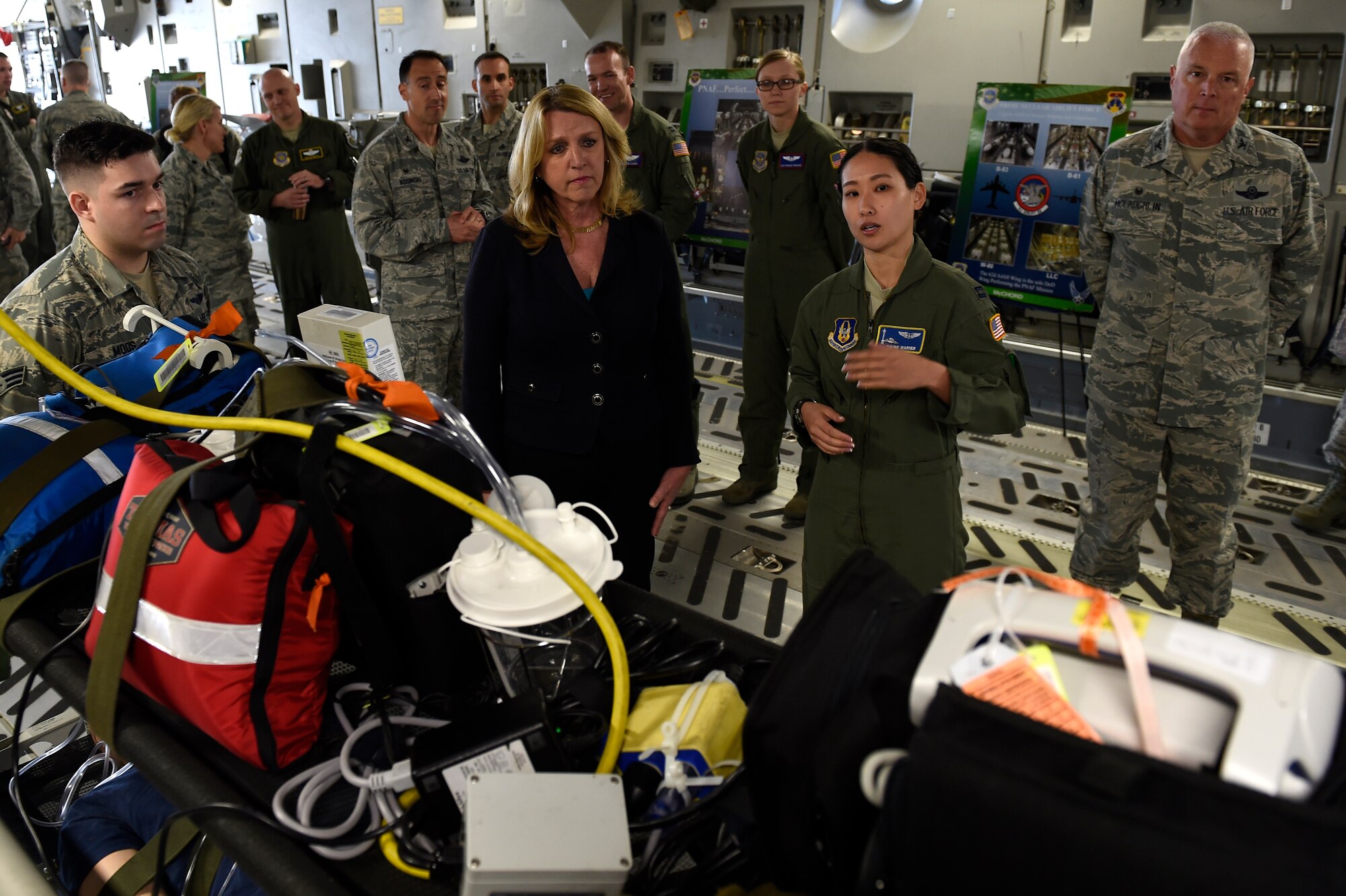 Secretary of the Air Force Deborah Lee James (second from left) talks with Airmen from the 446th Aeromedical Evacuation Squadron, April 26, 2016 at Joint Base Lewis-McChord, Wash. The 446th AES provides lifesaving transposition and medical care to patients from all over the world at a moment’s notice. (U.S Air Force photo/Tech. Sgt. Tim Chacon) 