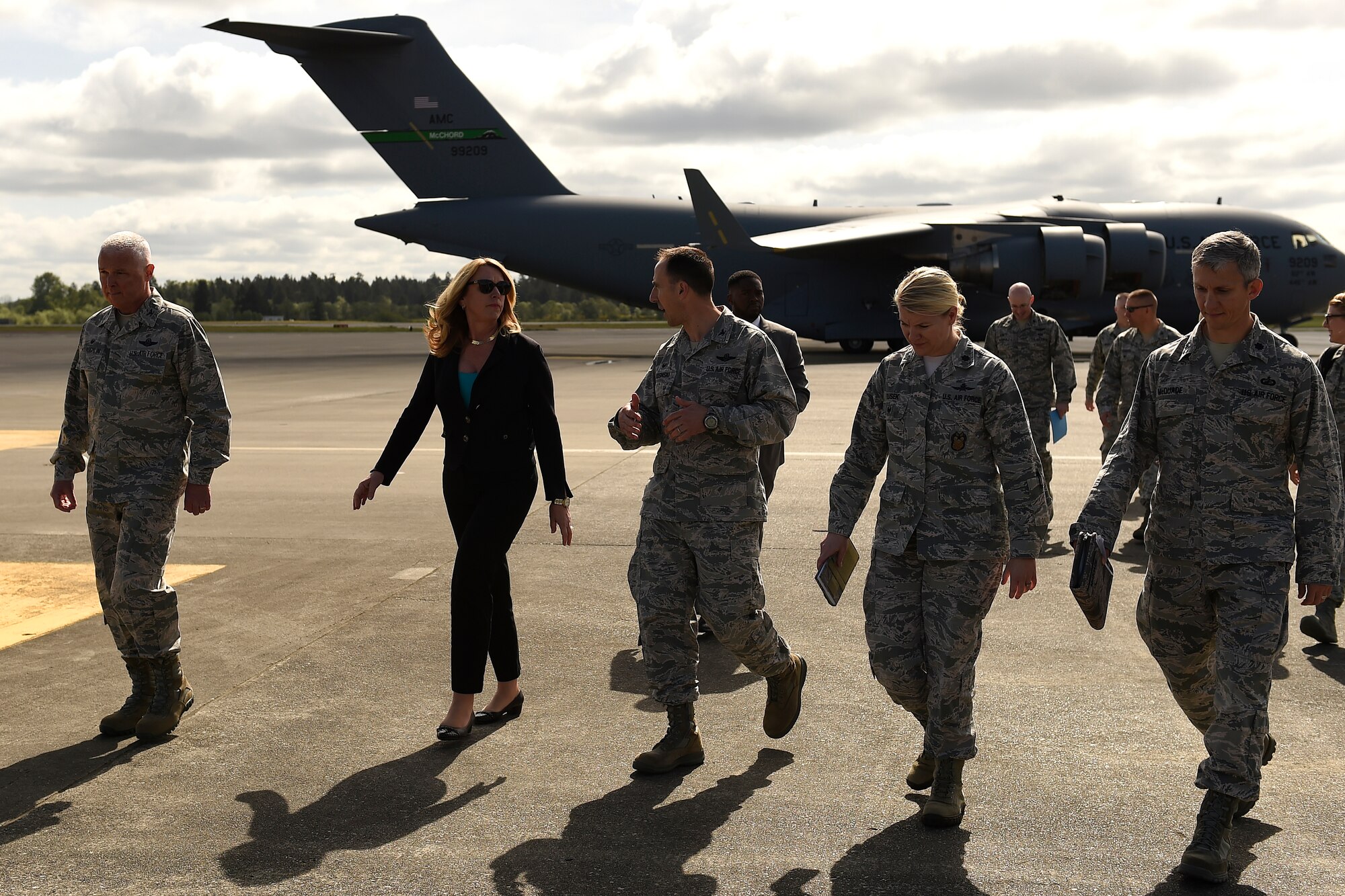 Secretary of the Air Force Deborah Lee James (second from left) arrives at Joint Base Lewis-McChord, Wash, April 26, 2016. James visited JBLM to learn about the mission of units assigned to McChord Field as well as learn about the Air Force’s relationship with their Army joint base partners. (U.S Air Force photo/Tech. Sgt. Tim Chacon)