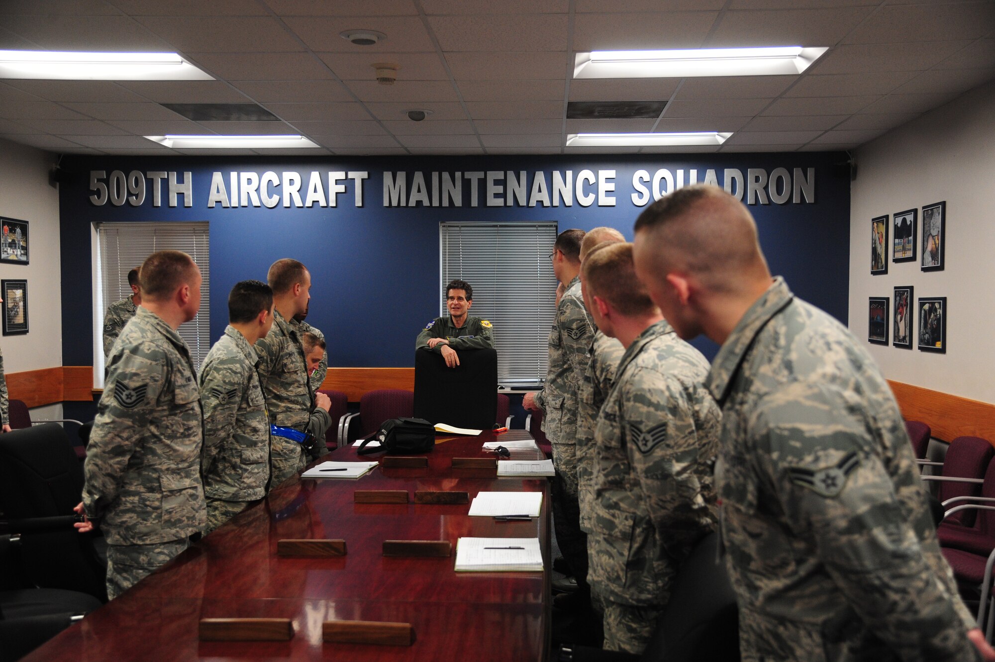 Dean Kamen, FIRST Robotics founder, speaks with Airmen from the 509th Aircraft Maintenance Squadron following an incentive flight in a B-2 Spirit at Whiteman Air Force Base, Mo., April 26, 2016. The U.S. Air Force and FIRST Robotics share an interest in developing youth into future leaders through exposure to education in science, technology, engineering and mathematics. (U.S. Air Force photo by Senior Airman Joel Pfiester)