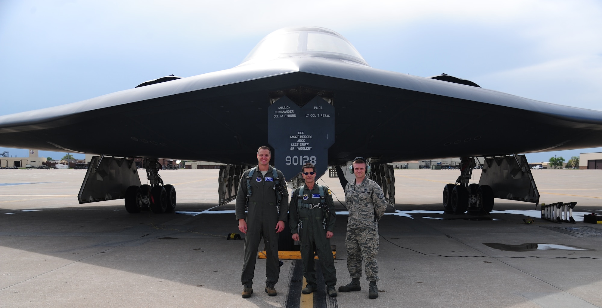 U.S. Air Force Capt. Daniel St. Clair, a B-2 Spirit pilot and FIRST Robotics alumni, left, Dean Kamen, FIRST Robotics founder, center, and U.S. Air Force Staff Sgt. Stephan Kuipers, a 509th Maintenance Squadron crew chief and FIRST Robotics alumni (right), pose in front of a B-2 Spirit at Whiteman Air Force Base, Mo., April 26, 2016. The U.S. Air Force and FIRST Robotics share an interest in developing youth into future leaders through exposure to education in science, technology, engineering and mathematics. (U.S. Air Force photo by Senior Airman Joel Pfiester)
