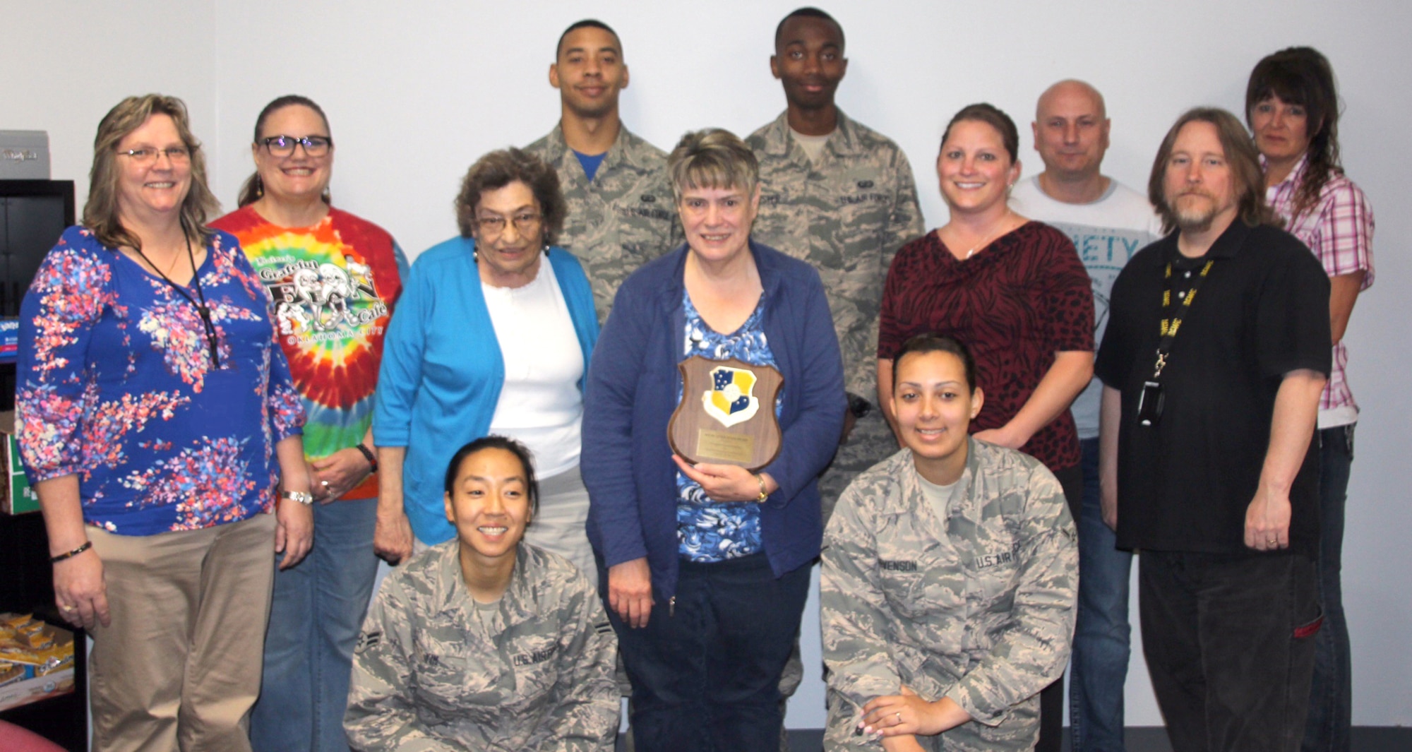 Members of the 72nd Comptroller Squadron Travel Team were recently honored with a Wildcatter Award by the 72nd Air Base Wing commander.