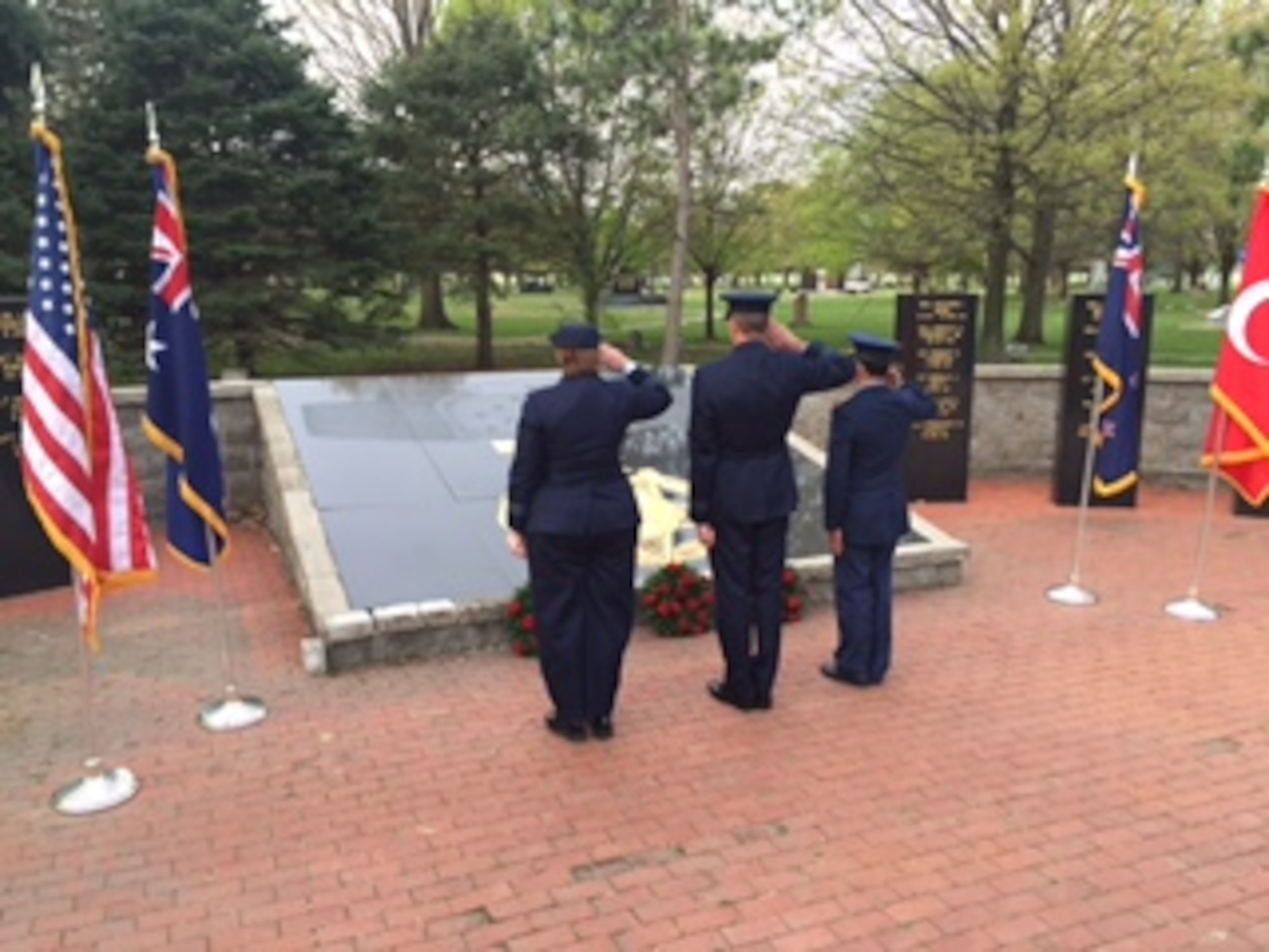 Members of the Royal Australian Air Force based at Wright-Patterson Air Force Base place wreaths April 25 in the Valor Park area of the Memorial Park at the National Museum of the U.S. Air Force during the 101st ANZAC (Australian and New Zealand Army Corps) Day commemoration. (Skywrighter photo/Amy Rollins)