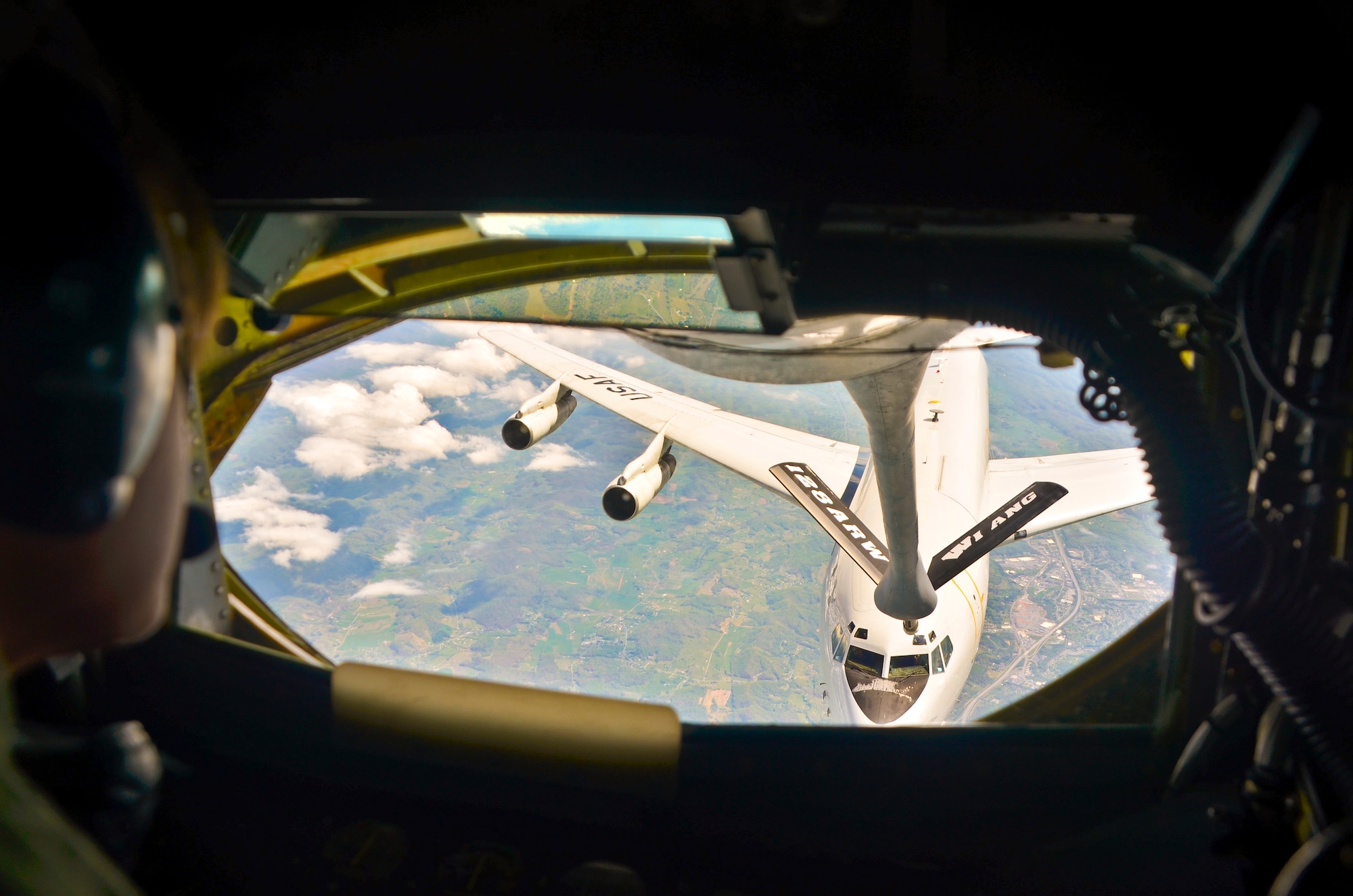 Master Sgt. Amanda S. Look, a boom operator with the 128th Air Refueling Wing, Wisconsin Air National Guard, flies the boom during a training mission with an E-8C Joint Surveillance Target Attack Radar System aircraft. The 128 ARW aircrew flew a 6-day mission ready airlift to transport Maryland Air National Guard members from their training in Guam to their home base near Baltimore April 20-25, 2016. (U.S. Air National Guard photo by Tech. Sgt. Jenna V. Lenski/Released)