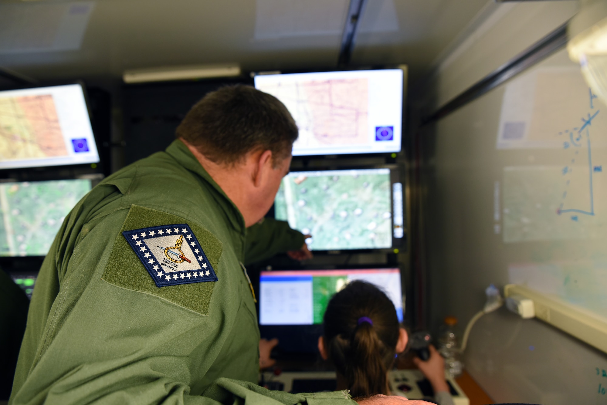 Students from Mansfield Elementary School learn about remotely piloted aircraft during their visit to the 188th Wing April 20, 2016, at Ebbing Air National Guard Base, Fort Smith, Ark. The students were shown careers in civil engineering, remotely piloted aircraft and security forces. (U.S. Air National Guard photo by Senior Airman Cody Martin/Released)