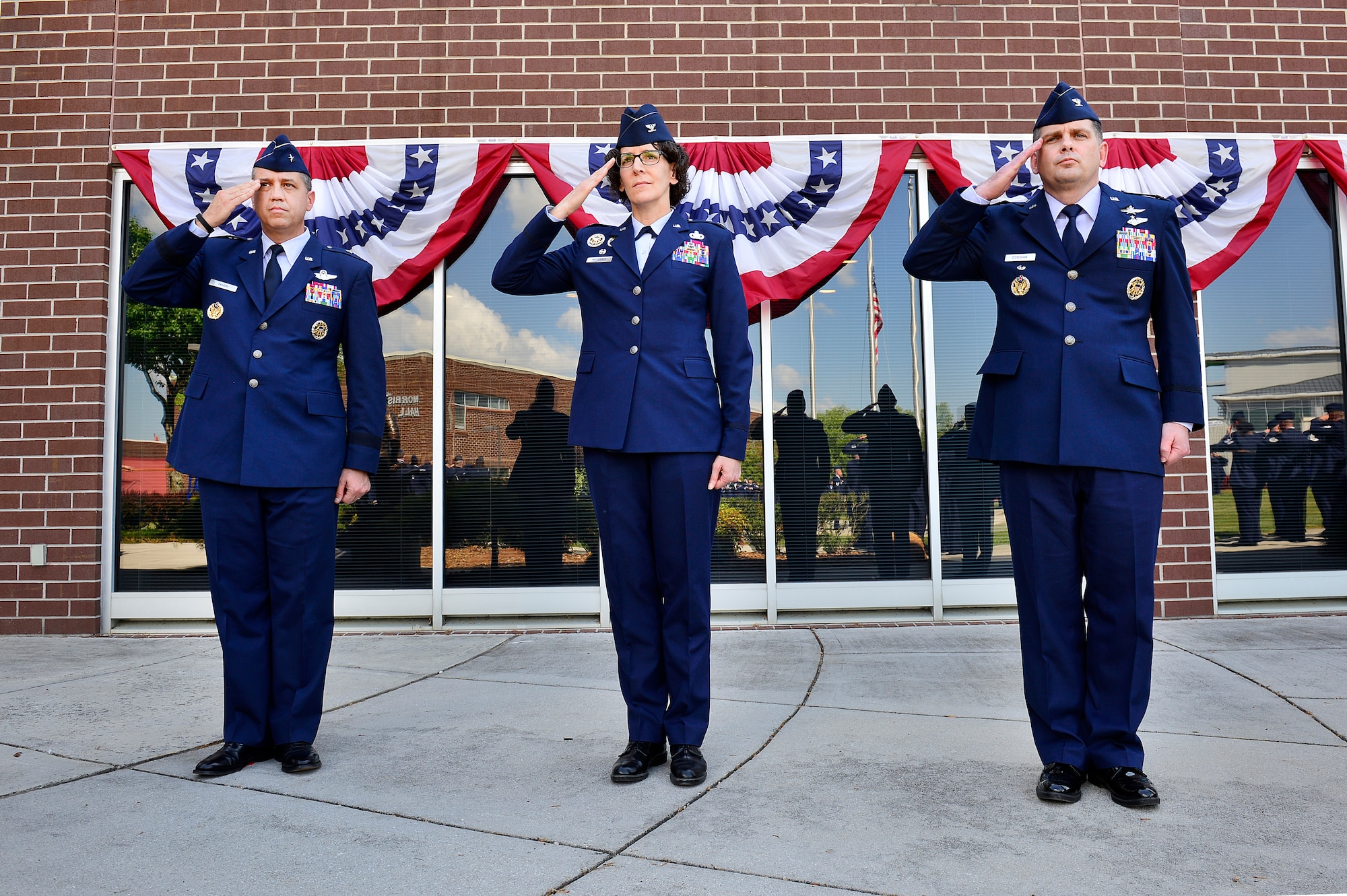MCGHEE TYSON AIR NATIONAL GUARD BASE, Tenn. - From left, Brig. Gen. Michael R. Taheri, commander of the Air National Guard Readiness Center, Col. Jessica Meyeraan and Col. Kevin M. Donovan, salute during the retreat ceremony here, April 28, 2016, at the I.G. Brown Training and Education Center. Colonel Donovan took command of the TEC, April 29, from Meyeraan, who is reassigned as the chief of staff, joint staff, National Guard Bureau. (U.S. Air National Guard photo by Master Sgt. Jerry Harlan/Released)
