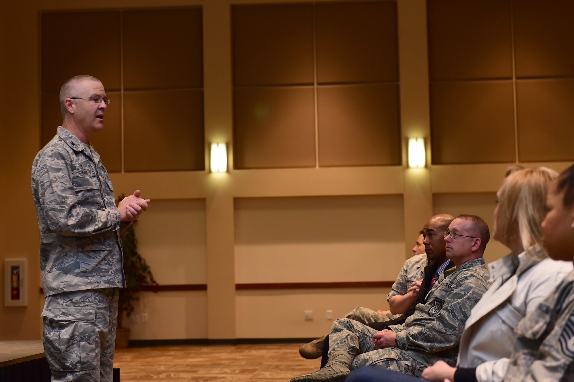 Col. Michael Kindt, 460th Medical Group commander, speaks about the improvements made to medical facilities on base April 28, 2016, at the Leadership Development Center on Buckley Air Force Base, Colo. Kindt addressed concerns regarding pharmaceutical refills, turnaround times and the upcoming dental facility. (U.S. Air Force photo by Airman 1st Class Luke W. Nowakowski/Released)