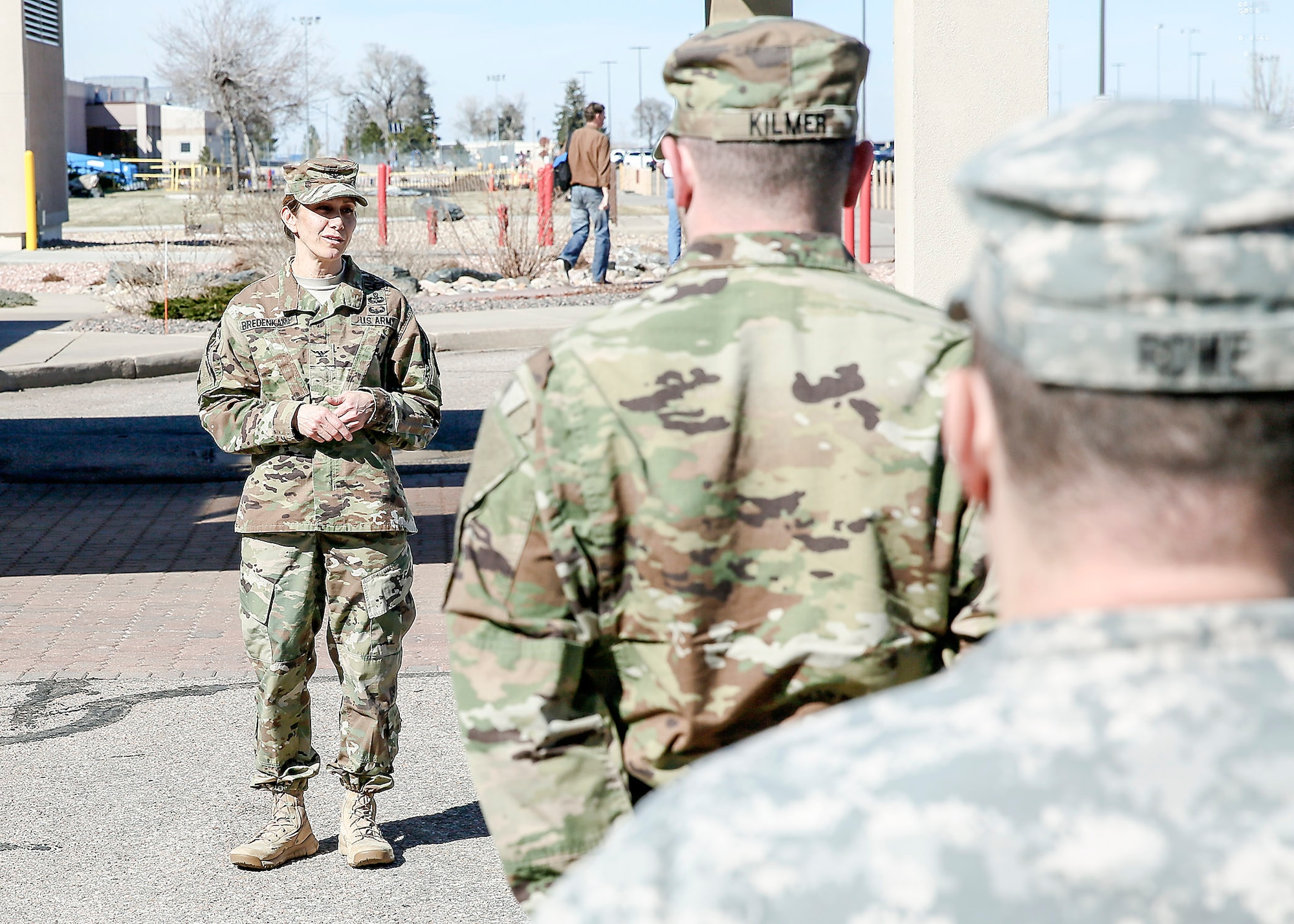 U.S. Army Col. Michele Bredenkamp, 704th Military Intelligence Battalion brigade commander, addresses the company during a Space Badge presentation ceremony March 10, 2016, at Buckley Air Force Base, Colo. The required space cadre experience for active duty Soldiers is: Basic Space Badge, 12 months; Senior Space Badge, 48 months; and Master Space Badge, 84 months, and for Reserve and National Guard Soldiers: Basic Space Badge, 24 months; Senior Space Badge, 60 months; and Master Space Badge, 96 months. (U.S. Army photo by Sgt. Kristopher Dimond/Released)