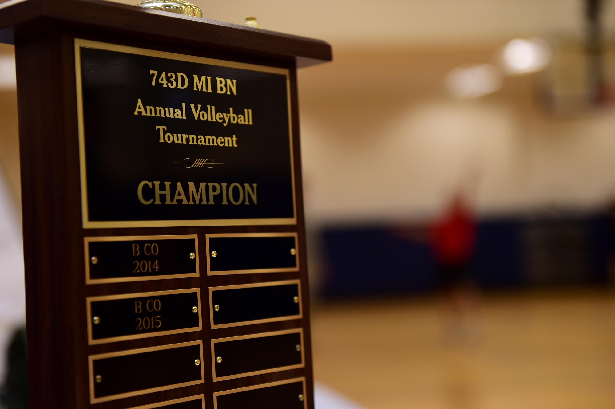 The 743d Military Intelligence Battalion annual volleyball tournament trophy is displayed April 28, 2016, at the Buckley Fitness Center on Buckley Air Force Base, Colo. The tournament was an event for the Commander’s Cup, an inter-battalion competition consisting of approximately eight events. (U.S. Air Force photo by Airman 1st Class Gabrielle Spradling/Released)