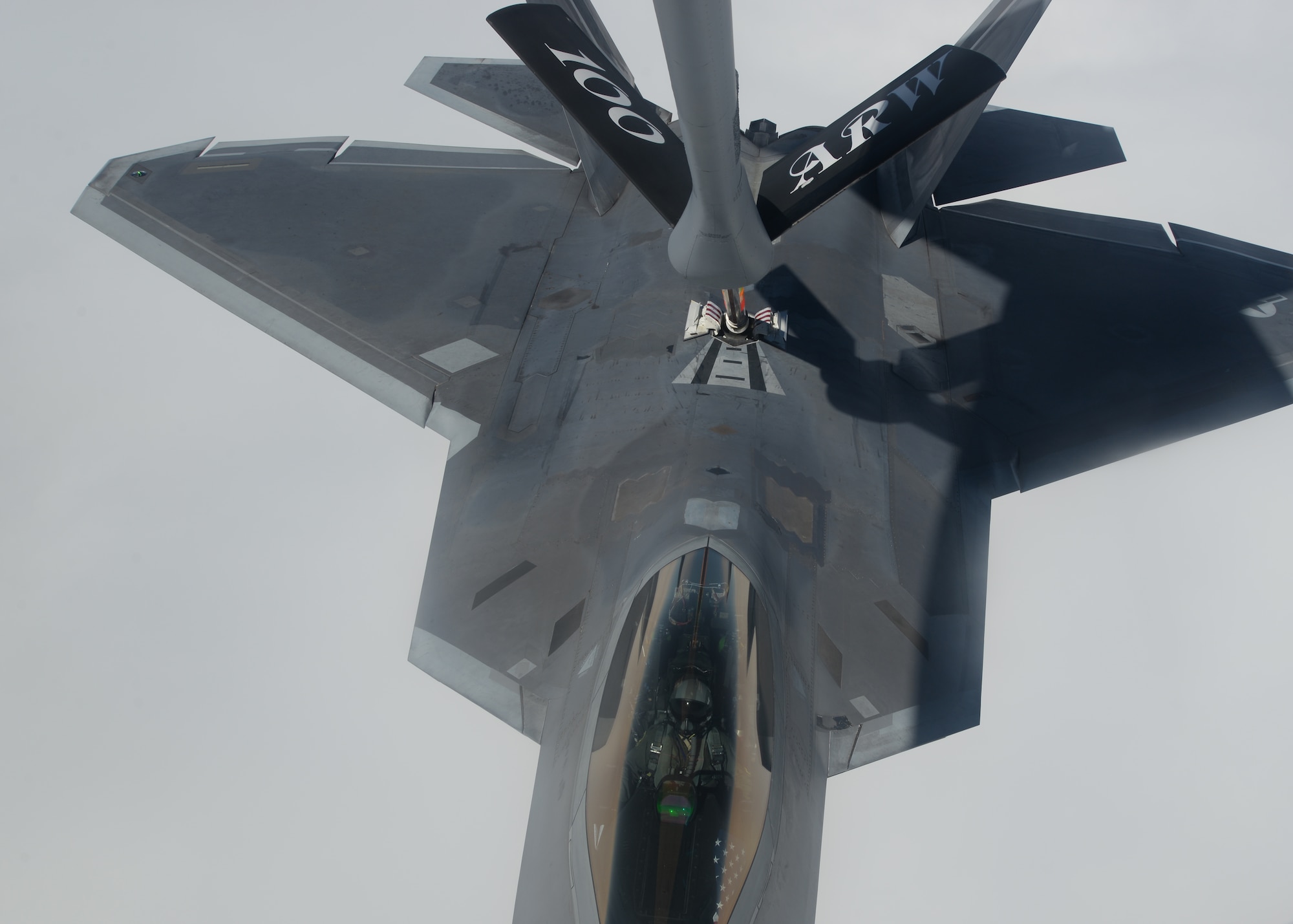 A U.S. Air Force F-22 Raptor assigned to the 95th Fighter Squadron at Tyndall Air Force Base, Fla., receives fuel from a 100th Air Refueling Wing KC-135 Stratotanker assigned to RAF Mildenhall, England, April 27, 2016, in route to Šiauliai Air Base, Lithuania. Both aircraft landed in Lithuania, demonstrating the U.S. commitment to NATO allies and the security of Europe. (U.S. Air Force photo by Staff Sgt. Nathan Tucker/Released)