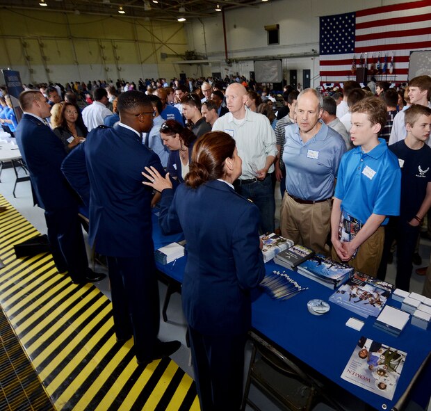 Representatives from the United States Air Force Academy discuss enrollment opportunities with 2016 Academy Day attendees at Dobbins Air Reserve Base, Ga., Apr 30, 2016. The annual event provides high school students the opportunity to meet with representatives from each of the service academies, including West Point, the U.S. Naval Academy, the U.S. Air Force Academy, the Coast Guard Academy, and the U.S. Merchant Marines Academy. (U.S. Air Force photo/Don Peek)