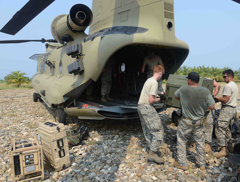 Service members from Joint Task Force-Bravo load equipment into a CH-47 Chinook helicopter assigned to the 1st battalion, 228th Aviation Regiment on the final day of a U.S. Southern Command Situational Assessment Team (S-SAT) validation exercise in Puerto Castilla, Honduras, April 27, 2016. In the event of a natural disaster or humanitarian crisis this 11-member team is capable of responding within 18 hours to conduct assessments before significant military resources are committed to a humanitarian assistance or disaster response event. (U.S. Army photo by Frederick Hoyt/Released) 
