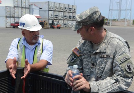 Army Forces Battalion Commander, Lt. Col. Brian Henderson, the Joint Task Force-Bravo S-SAT Team Leader, speaks with a Port Authority official in Puerto Castilla, Honduras, during a three-day U.S. Southern Command Situational Assessment Team (S-SAT) validation exercise, April 26, 2016. This exercise took place during an Army SOUTH-hosted exercise called Fuerzas Aliadas Humanitarias, which is an annual event that tests the capabilities of Caribbean and Central American nations to respond to a natural disaster or humanitarian crisis. (U.S. Army photo by Frederick Hoyt/Released) 