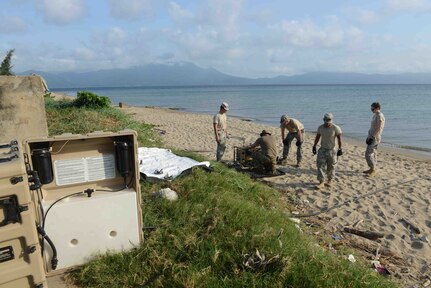 Service members from Joint Task Force-Bravo, part of an S-SAT Team, set up a water purification system in the Caribbean Sea during a three-day validation exercise at Puerto Castillo, Honduras, April 25, 2016. In the event of a natural disaster or humanitarian crisis this 11-member team is capable of responding within 18 hours to conduct assessments before significant military resources are committed to a humanitarian assistance or disaster response event. The exercise took place during an Army SOUTH-hosted exercise called Fuerzas Aliadas Humanitarias, which is an annual event that tests the abilities of Caribbean and Central American nations to respond to a natural disaster or humanitarian crisis. (U.S. Army photo by Frederick Hoyt/Released) 