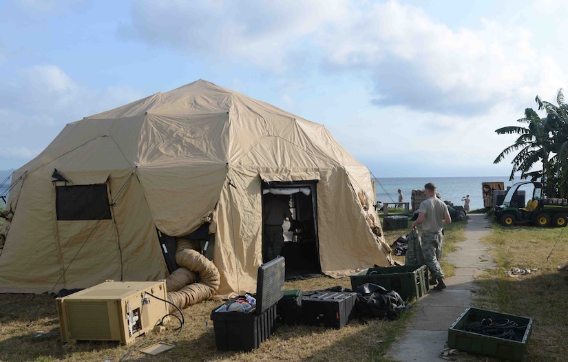 Air Force and Army service members from Joint Task Force-Bravo finish setting up a mobile tactical operations center in Puerto Castilla, Honduras, as part of a SOUTHCOM Situational Assessment Team (S-SAT), validation exercise, April 25, 2016. This three-day exercise took place during an Army SOUTH-hosted exercise called Fuerzas Aliadas Humanitarias, which is an annual event that tests the abilities of Caribbean and Central American nations to respond to a natural disaster or humanitarian crisis. (U.S. Army photo by Frederick Hoyt/Released) 