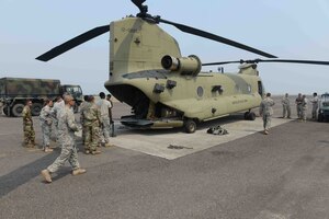 Army Forces Battalion, Headquarters Support Company Service Members, assigned to Joint Task Force-Bravo, at Soto Cano Air Base, Honduras, load a CH-47 Chinook helicopter, assigned to the 1st battalion, 228th Aviation Regiment, in preparation for a three-day deployment to validate their role as a SOUTHCOM Situational Assessment Team, April 25, 2016. The 11-member S-SAT team traveled to Puerto Castilla, Honduras, where they participated in a portion of an Army SOUTH-hosted exercise called Fuerzas Aliadas Humanitarias, which is an annual event that tests the abilities of Caribbean and Central American nations to respond to a natural disaster or humanitarian crisis. (U.S. Army photo by Frederick Hoyt/Released) 