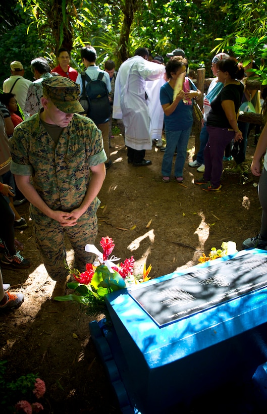 MERIZO, Guam (July 15, 2016) – Capt. Brian Ralston and Sgt. Chris Henderson, from Marine Corps Activity Guam, joined the citizens of Guam at the Tinta and Faha Massacre Memorial sites to remember those that lost their lives during occupation in World War II.
