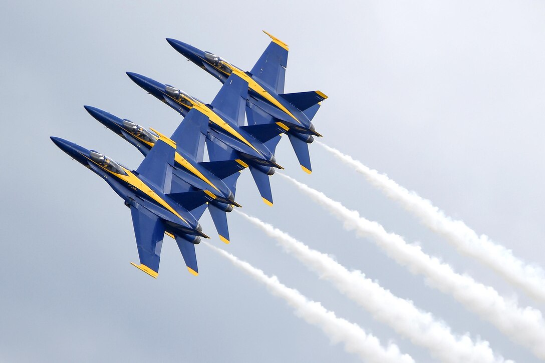 The U.S. Navy Blue Angels perform precision formation flying and aerobatics during the Arctic Thunder Special Needs and Family Day at Joint Base Elmendorf-Richardson, Alaska, July 29, 2016. Air Force photo by Alejandro Pena