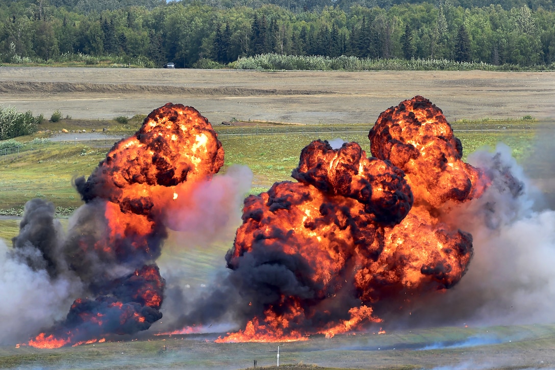 A pyrotechnics display explodes during the Arctic Thunder Special Needs and Family Day at Joint Base Elmendorf-Richardson, Alaska, July 30, 2016. Air Force photo by Justin Connaher
