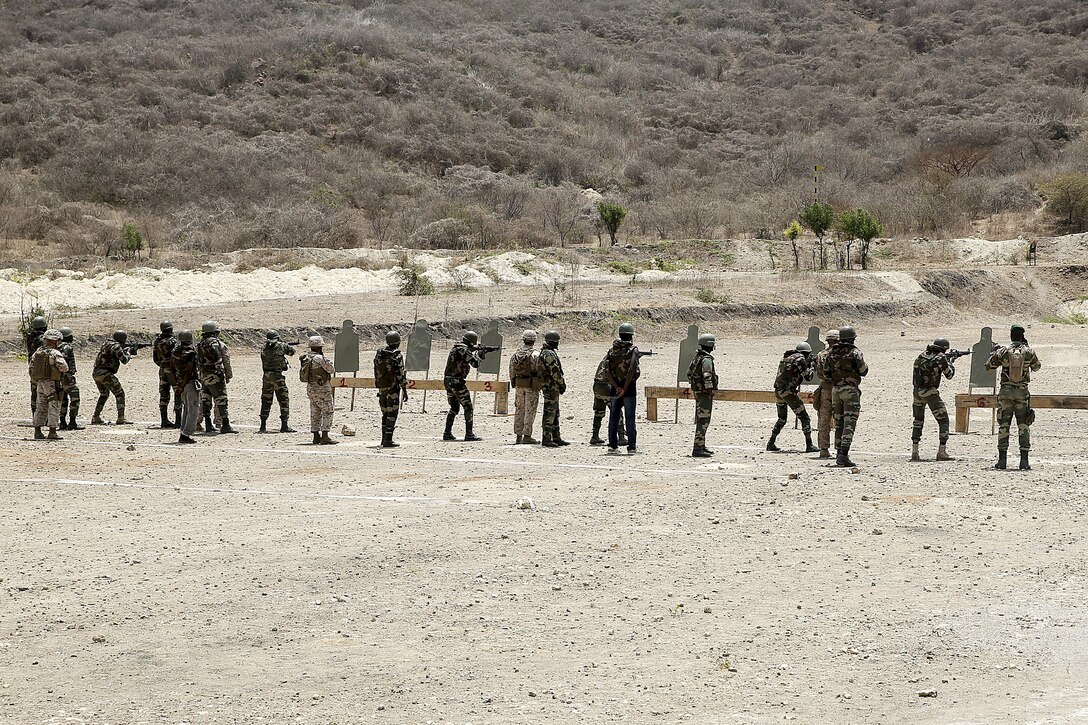 Marines with Special Purpose Marine Air-Ground Task Force Crisis Response-Africa conduct a live-fire range with the Compagnie Fusilier de Marin Commando in Thies, Senegal, July 22, 2016. Marines and the COFUMACO conducted a three-week training exercise that included advanced combat firing techniques, a machine gun range and a live-fire platoon attack range. (U.S. Marine Corps photo by 1st Lt. Eric Abrams /released)