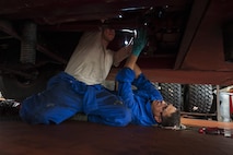 U.S. Air Force Col. Steven Zubowicz, 52nd Mission Support Group commander, right, assists Airman 1st Class Jordan Papaloas, 52nd Logistic Readiness Squadron special vehicle maintenance technician, fix a fire truck at Spangdahlem Air Base, Germany, July 28, 2016. The 52nd Mission Support Group leadership had the opportunity to work alongside and learn firsthand what 52nd LRS, vehicle management special purpose shop Airmen do. (U.S. Air Force photo by Staff Sgt. Jonathan Snyder/Released)