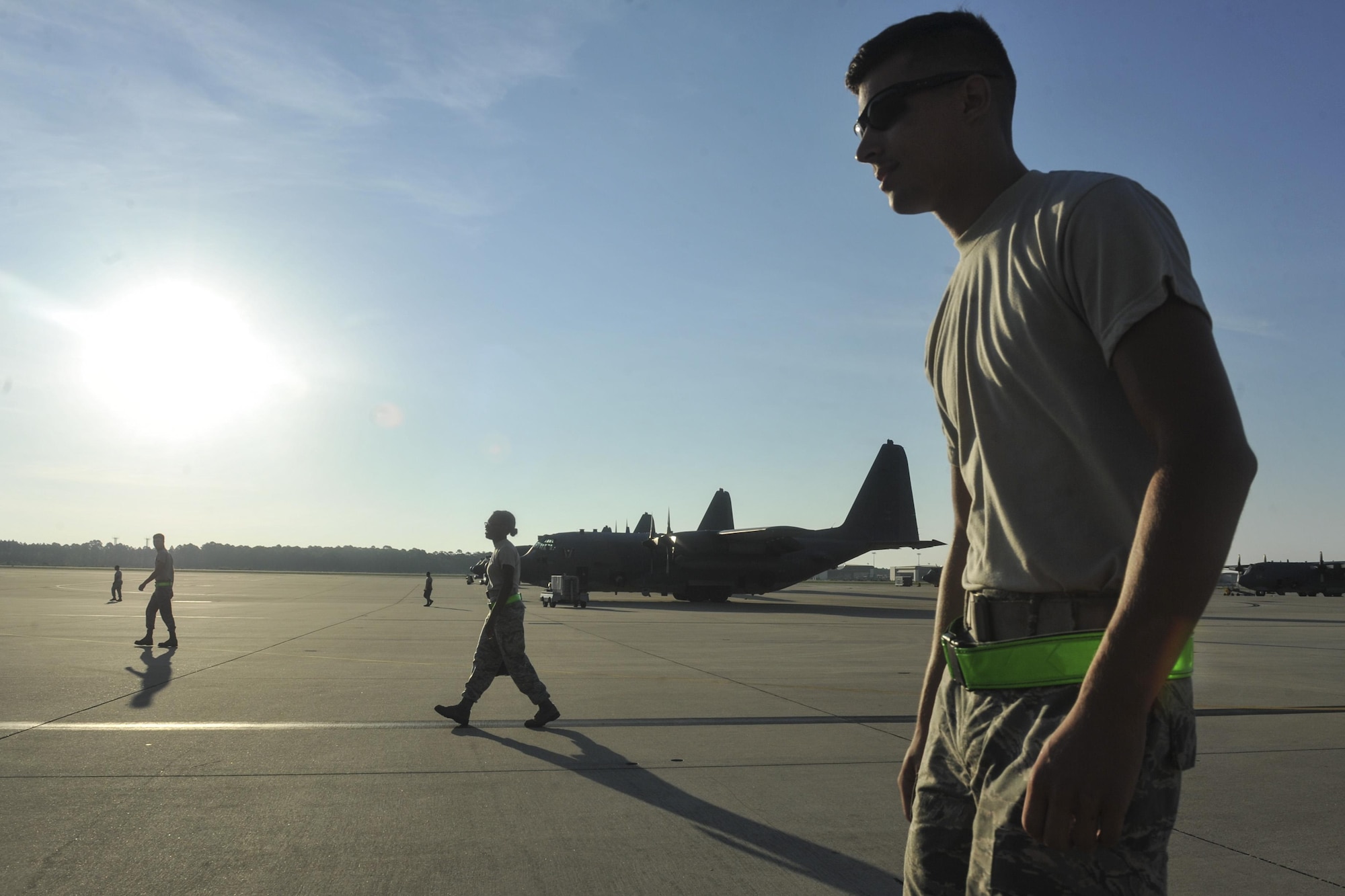 Air Commandos from the 4th Aircraft Maintenance Unit search for debris during a foreign object debris walk at Hurlburt Field, Fla., July 20, 2016. The performance of a FOD walk ensures no flightline debris causes damage to any aircraft. (U.S. Air Force photo by Airman Dennis Spain)
