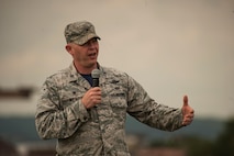 U.S. Air Force Col. Joseph McFall, 52nd Fighter Wing commander, speaks at the opening ceremony of Relay For Life at Spangdahlem Air Base, Germany, July 29, 2016. Airmen and their families raised more than $12,000 for the American Cancer Society during this 24-hour relay event. (U.S. Air Force photo by Staff Sgt. Jonathan Snyder/Released)
