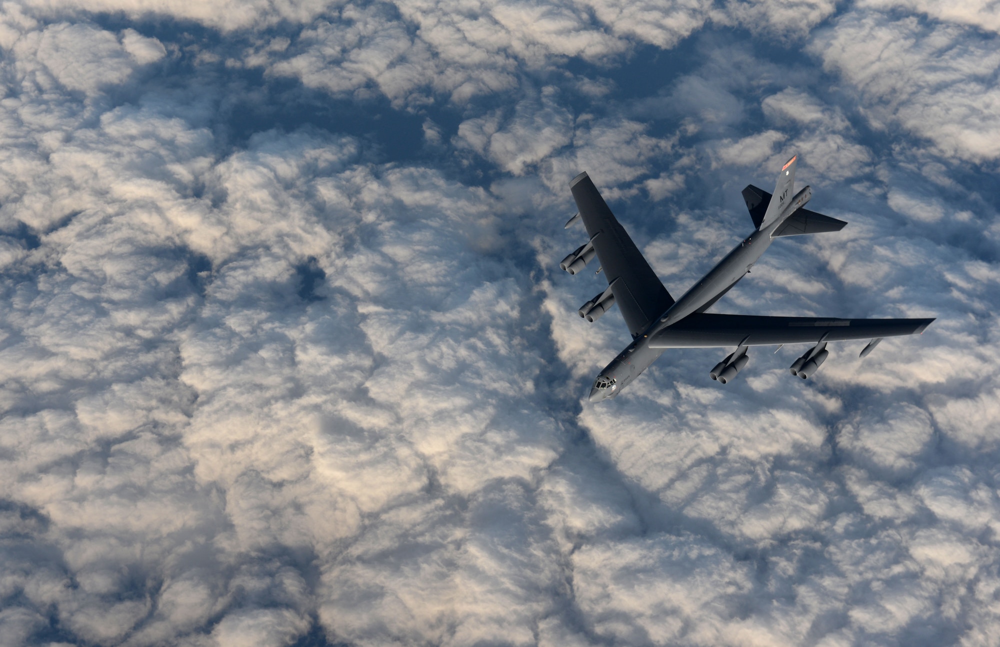 A KC-135 Stratotanker from RAF Mildenhall, England, refuels a B-52 Stratofortress from Minot Air Force Base, North Dakota, in support of Operation Polar Roar over Scotland, Aug. 1, 2016. Polar Roar is a U.S. Strategic Command operation designed to strengthen bomber crews' interoperability and demonstrate ability for the U.S. bomber force to provide flexible and vigilant long-range global-strike capability. (U.S. Air Force photo by Staff Sgt. Kate Thornton)