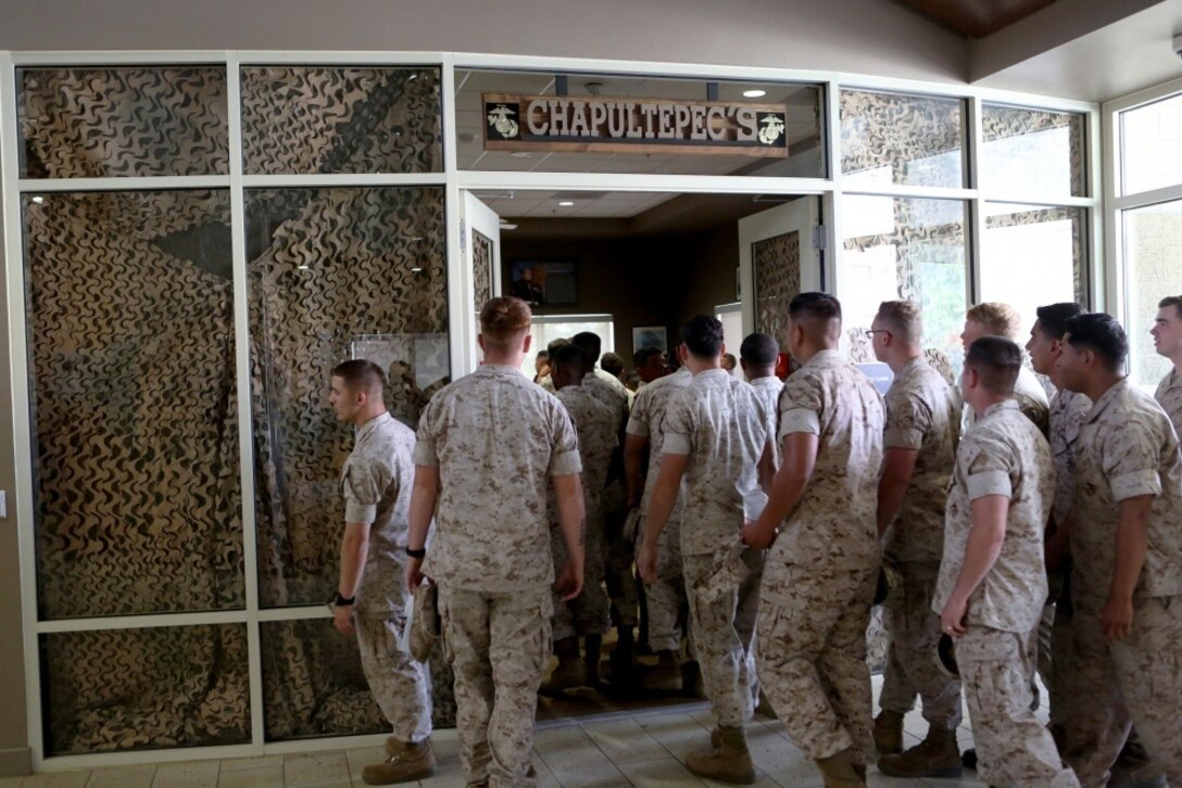 U.S. Marine non-commissioned officers from 7th Engineer Support Battalion, 1st Marine Logistics Group, enter their new NCO lounge, known as Chapultepec’s, in their barracks building aboard Camp Pendleton, Calif., April 15, 2016. The newly opened lounge is dedicated to give the NCOs a place in the barracks to come together and unwind, forming stronger camaraderie in their ranks. (U.S. Marine Corps photo by Cpl. Carson Gramley/released)