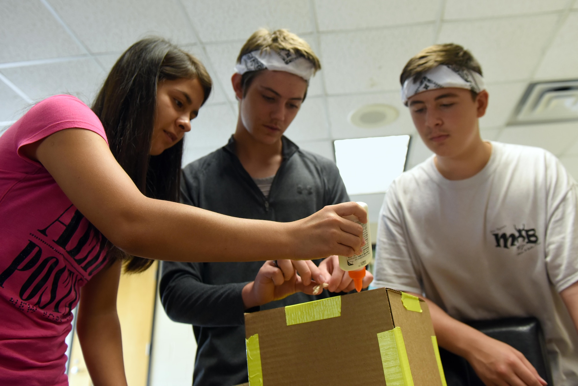 Make It Better 4 Teens campers make their own super hero that has the power of resilience, July 27, 2016, at Seymour Johnson Air Force Base, North Carolina. This year’s MIB4T camp theme was “Marvel versus DC” and how each superhero could benefit from each pillar of comprehensive Airman fitness. (U.S. Air Force photo/Airman 1st Class Ashley Williamson)