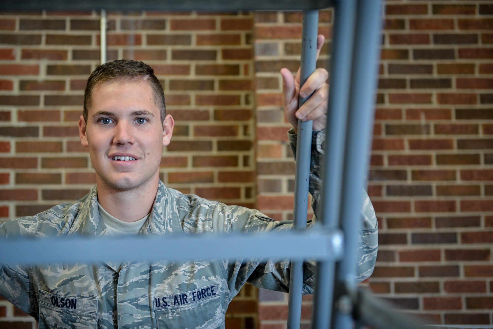 Staff Sgt. Tyler J. Olson, 934th Logistics Readiness Squadron, spent the day working in the Individual Protective Equipment section within the supply unit issuing protective chemical equipment to incoming Airman at the Minneapolis-St. Paul Air Reserve Station. Olson won the Air Force Reserve Command’s 2015 Logistics Airman of The Year award. (U.S. Air Force photo by Staff Sgt. Corban D. Lundborg) 