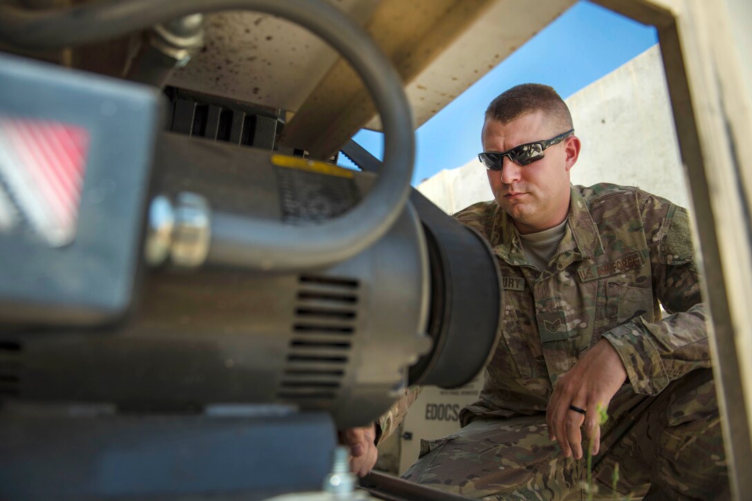 Air Force Staff Sgt. Alexander Stansbury adjusts a blower motor at Bagram Airfield, Afghanistan, July 18, 2016. Stansbury is a bioenvironmental equipment technician assigned to the 455th Expeditionary Medical Group.  Air Force photo by Senior Airman Justyn M. Freeman