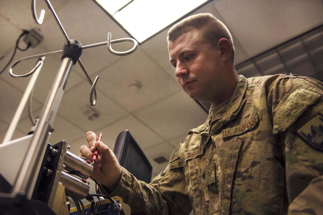 Air Force Staff Sgt. Alexander Stansbury checks the voltage on a hemodialysis unit at Bagram Airfield, Afghanistan, July 18, 2016. Stansbury is a bioenvironmental equipment technician assigned to the 455th Expeditionary Medical Group. Clinical engineers perform preventative maintenance to maintain hospital equipment and machinery. Air Force photo by Senior Airman Justyn M. Freeman