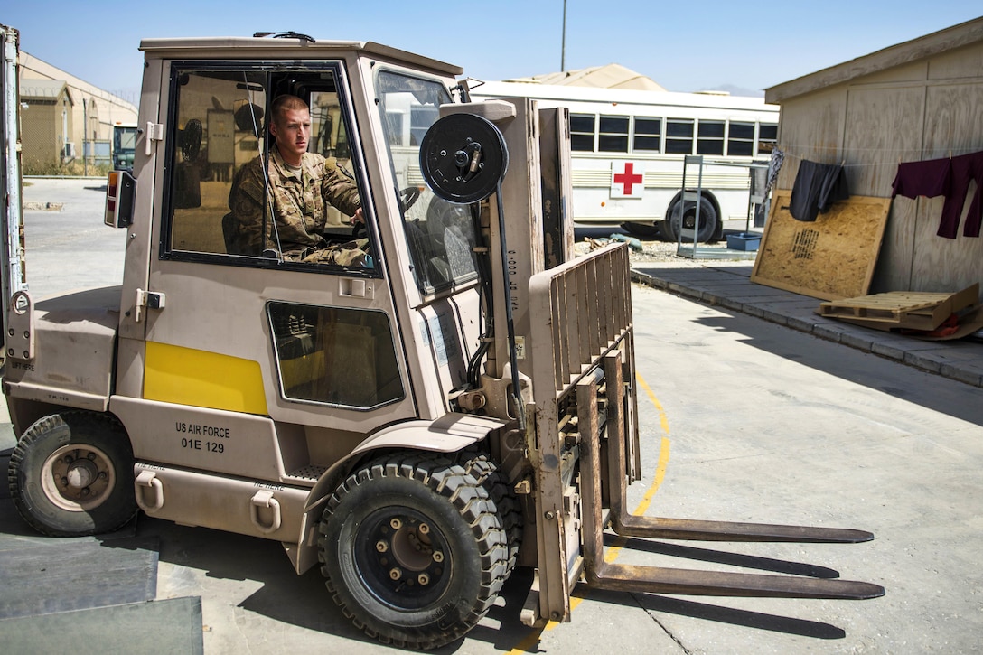 Air Force Senior Airman Chase Stanford operates a forklift to move pallets of medical supplies at Bagram Airfield, Afghanistan, July 23, 2016. Stanford is a medical logistics technician assigned to the 455th Expeditionary Medical Group. Air Force photo by Senior Airman Justyn M. Freeman