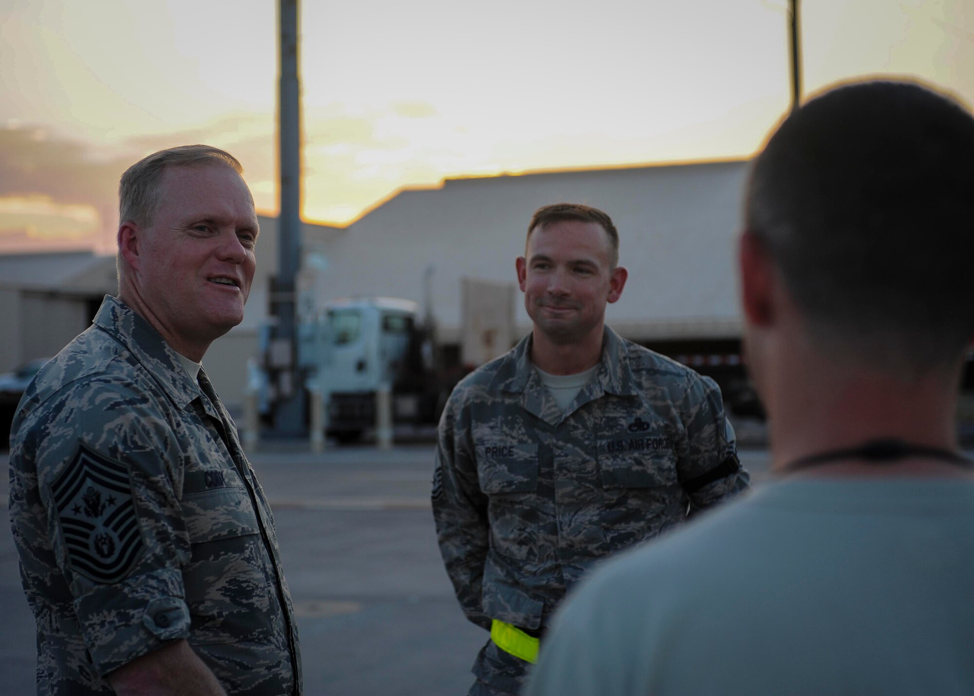 Chief Master Sgt. of the Air Force James A. Cody speaks with Airmen from Joint Base Langley-Eustis, Va. during a meet and great on the flightline at Nellis Air Force Base, Nev., July 27, 2016. During Cody’s visit, Airmen from around the Air Force are temporarily deployed to Nellis AFB for Red Flag 16-3 where they will train for three weeks in air, space and cyberspace. (U.S. Air Force photo by Senior Airman Jake Carter/Released)