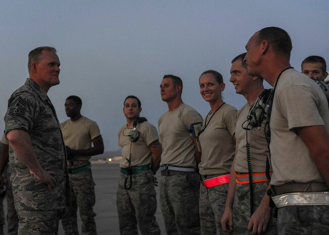 Chief Master Sgt. of the Air Force James A. Cody speaks with Airmen apart of the E-3 AWACS from Tinker Air Force Base, Okla. during a meet and great on the flightline at Nellis AFB, Nev., July 27, 2016. While visiting with Airmen, Cody answered Airmen’s questions regarding the Air Force as well as their respective career field. (U.S. Air Force photo by Senior Airman Jake Carter/Released)