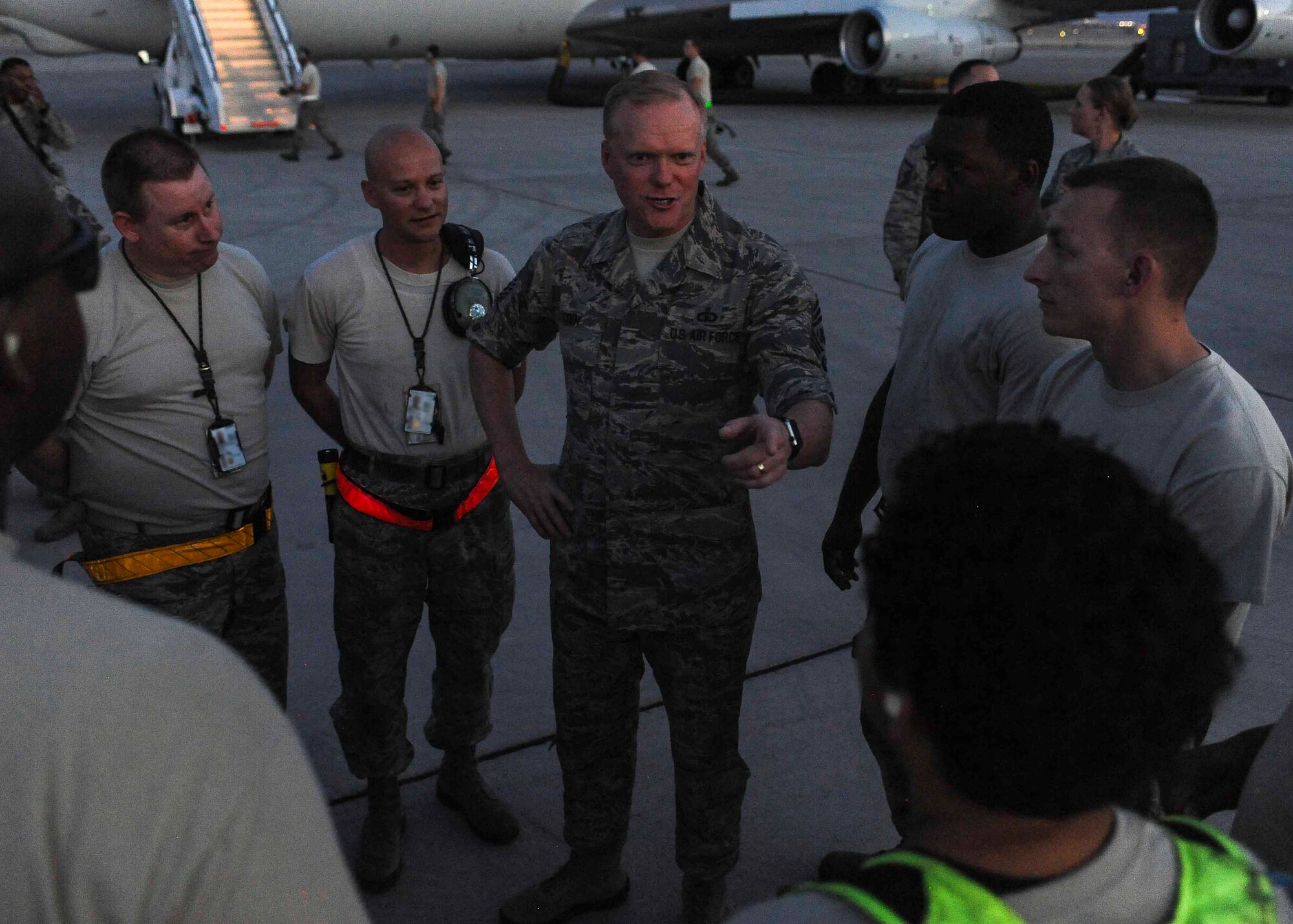 Chief Master Sgt. of the Air Force James A. Cody speaks with Airmen assigned to an E-8 Joint Stars from Robins Air Force Base, Ga. during a meet and great on the flightline at Nellis AFB, Nev., July 27, 2016. During the conversations, Cody would ask Airmen what their biggest concerns are for the Air Force and offered guidance on how the leadership of the U.S. Air Force is handling the situation. (U.S. Air Force photo by Senior Airman Jake Carter/Released)