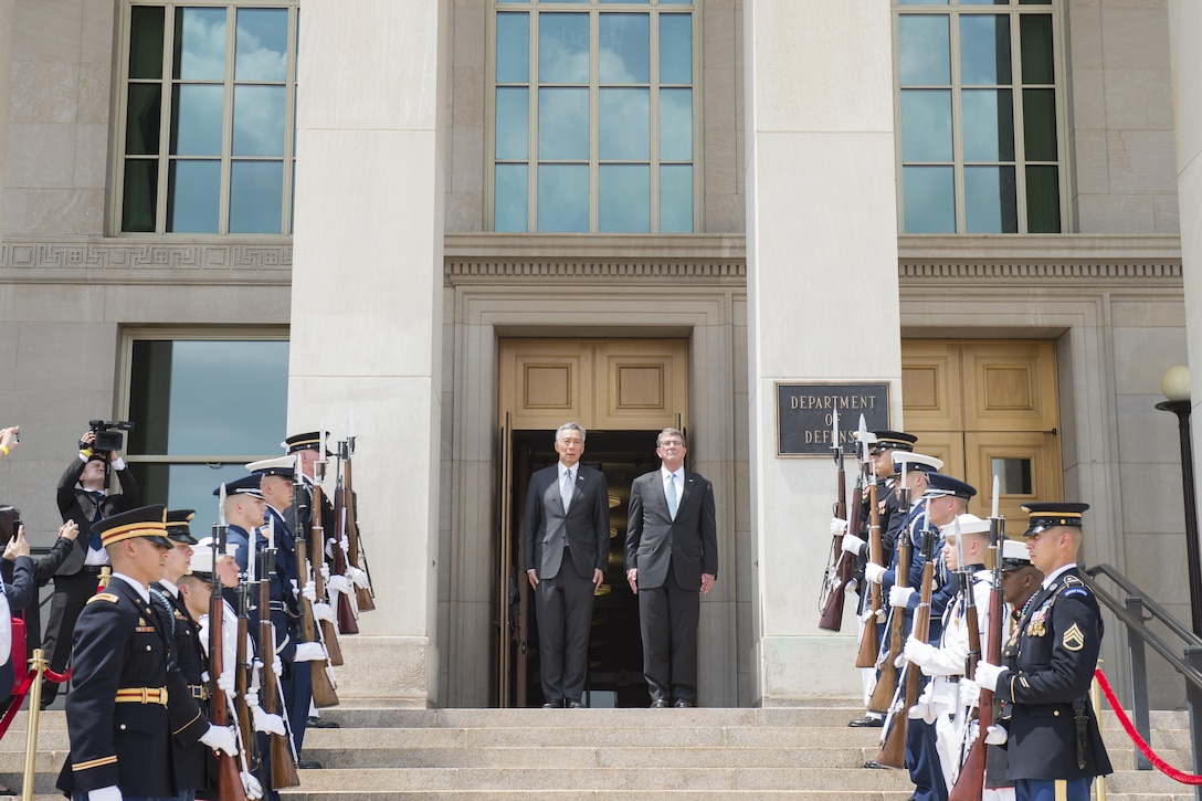 Defense Secretary Ash Carter greets Prime Minister of Singapore Lee Hsien Loong at the Pentagon in Washington, D.C., Aug. 1, 2016. DoD photo by Air Force Tech. Sgt. Brigitte N. Brantley