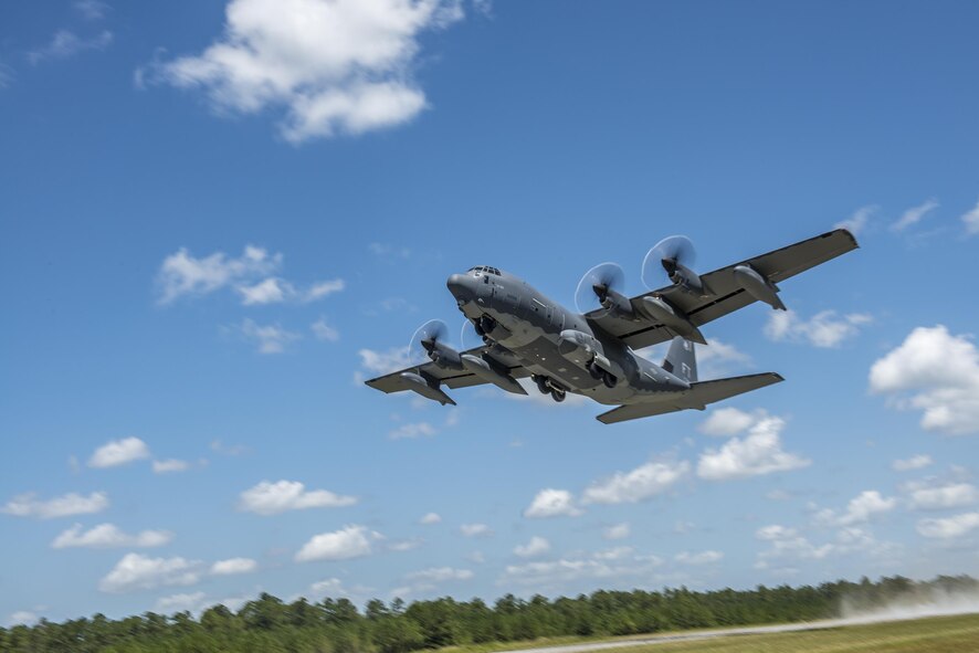 An HC-130J Combat King II from the 71st Rescue Squadron takes off from the Bemiss Field unimproved landing zone, July 29, 2016, at Grand Bay Bombing and Gunnery Range, Ga. This flight marked the first time an HC-130J landed at the ULZ on Bemiss Field, which was previously used for airdrops and helicopter landings. The landing validated the pilot’s training for future operations in austere locations and met requirements for training that cannot be accomplished on paved runways or assault strips. (U.S. Air Force photo by Tech. Sgt. Zachary Wolf)
