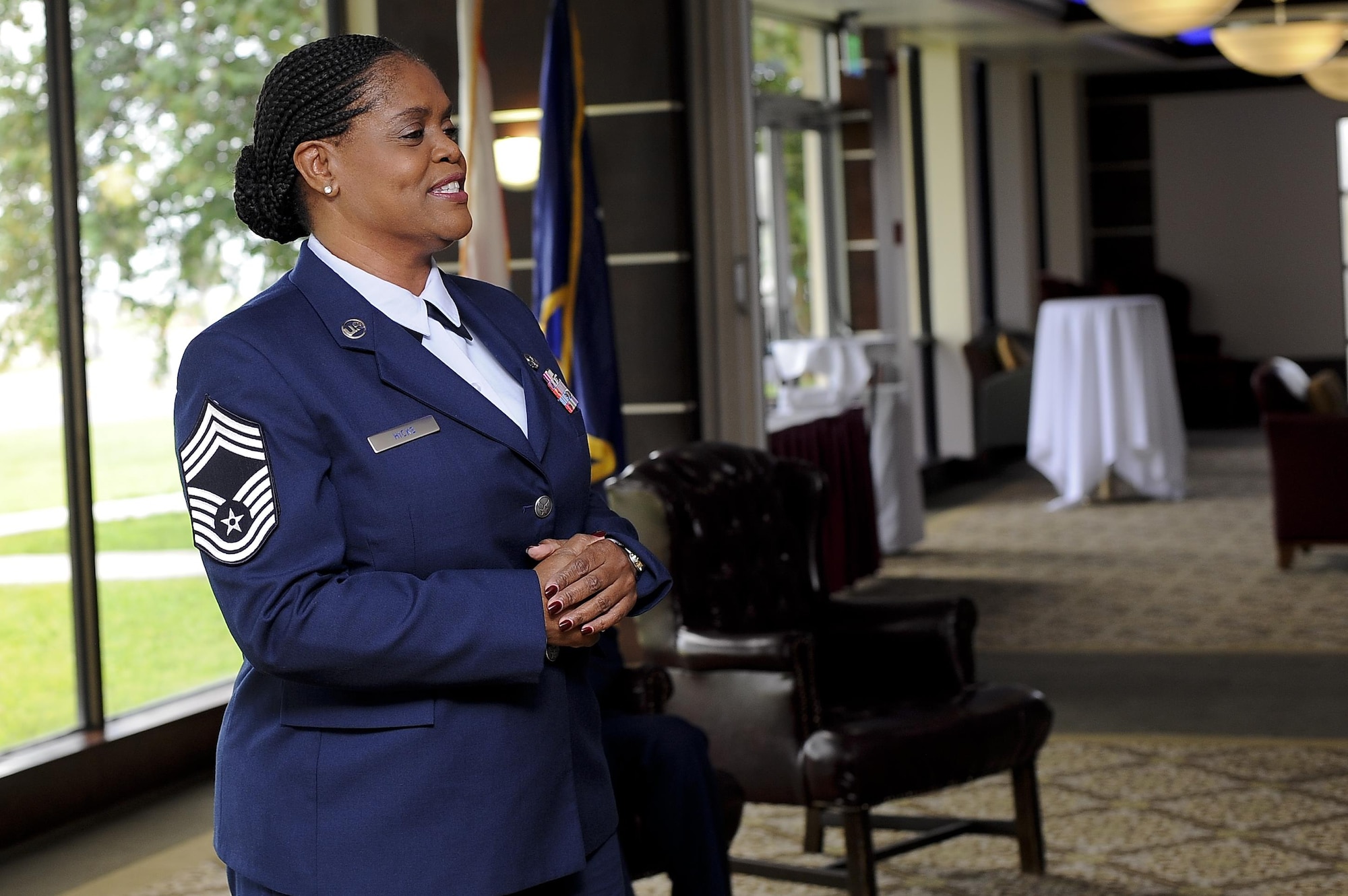 Chief Master Sgt. Lessie Hicks, mission support chief with the 290th Joint Communications Support Squadron (JCSS), speaks at her promotion ceremony, July 29, 2016, at MacDill Air Force Base, Fla. Hicks is the first African-American and female chief at the 290th JCSS. (U.S. Air Force photo by Airman 1st Class Mariette Adams)